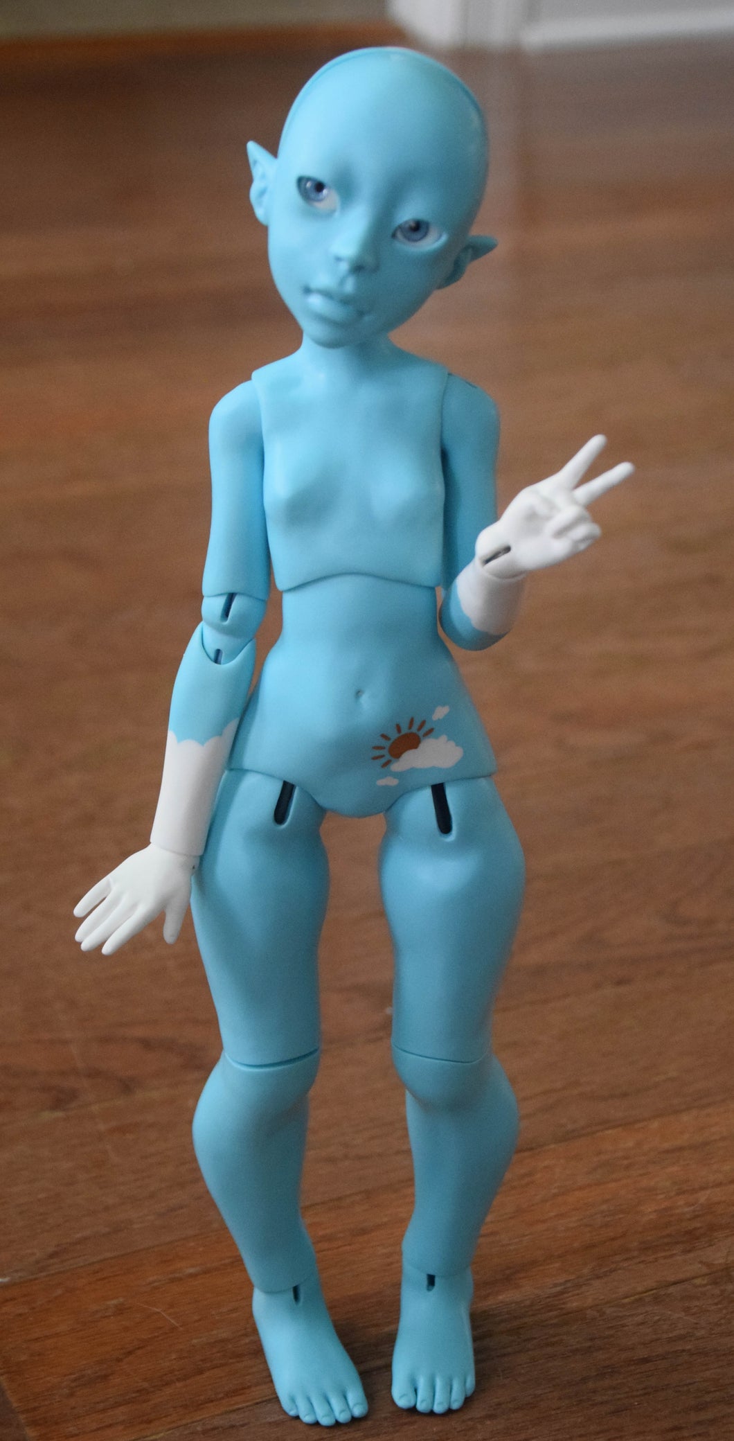 Light Blue Dahlia with clouds and sun