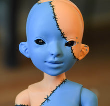 Blue and Tangerine Orchidaceae with stitch "Tattoos"